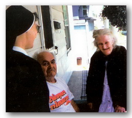 Sister talking to an elderly couple