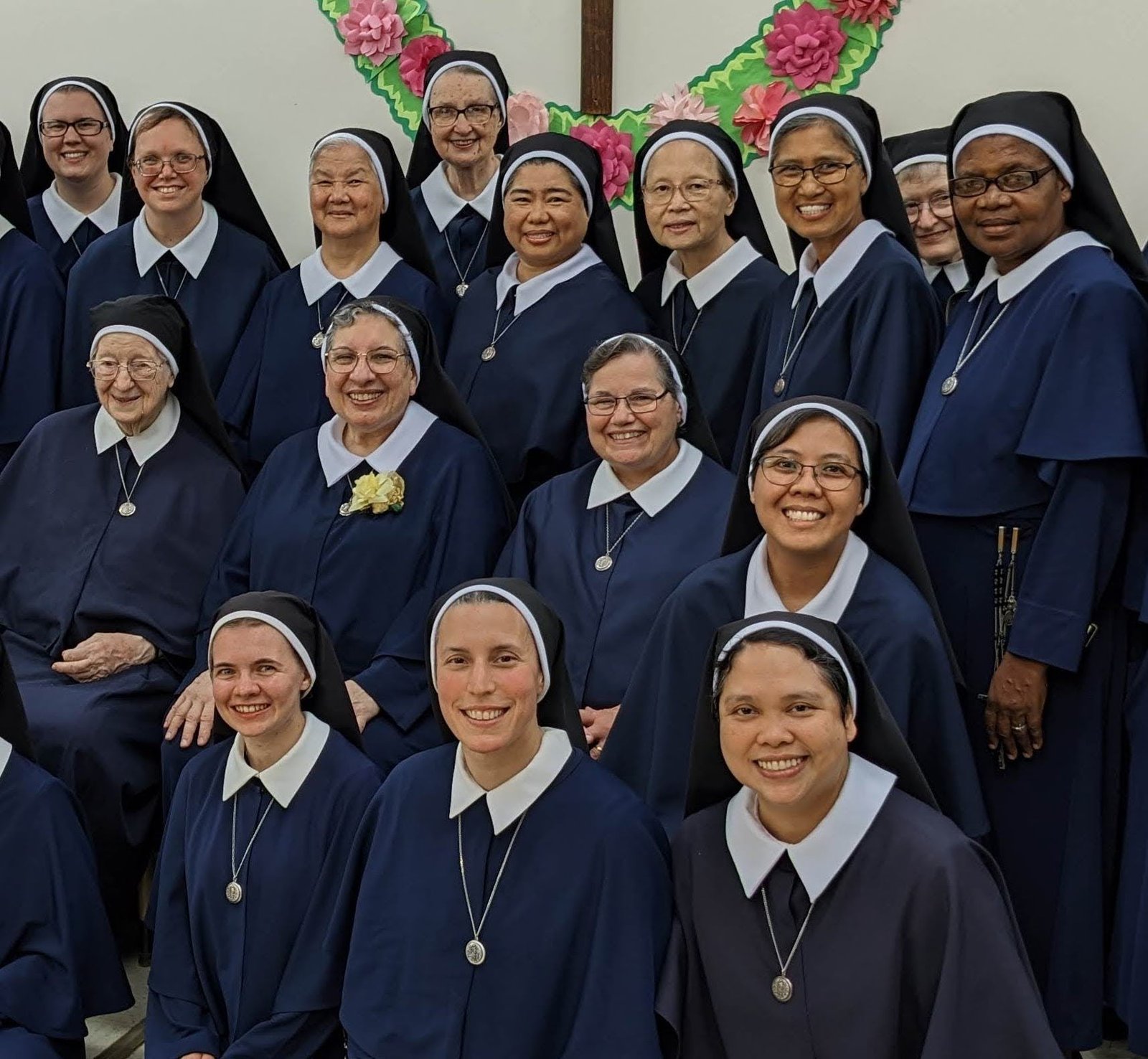 Four Sisters singing in choir